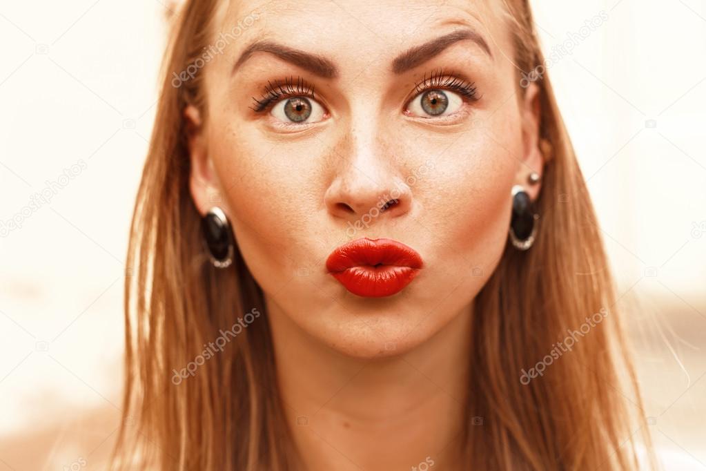 funny woman  with surprised duck face