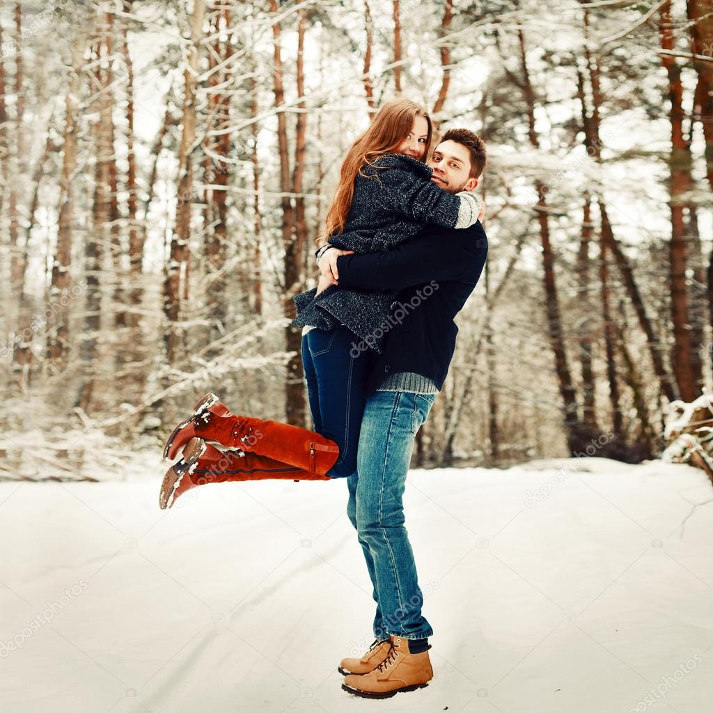 happy couple having fun in winter