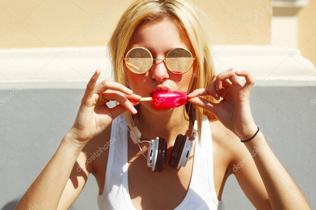 blonde woman eating ice cream