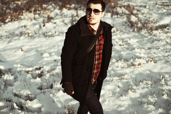 Young handsome man posing outdoor — Stock Photo, Image