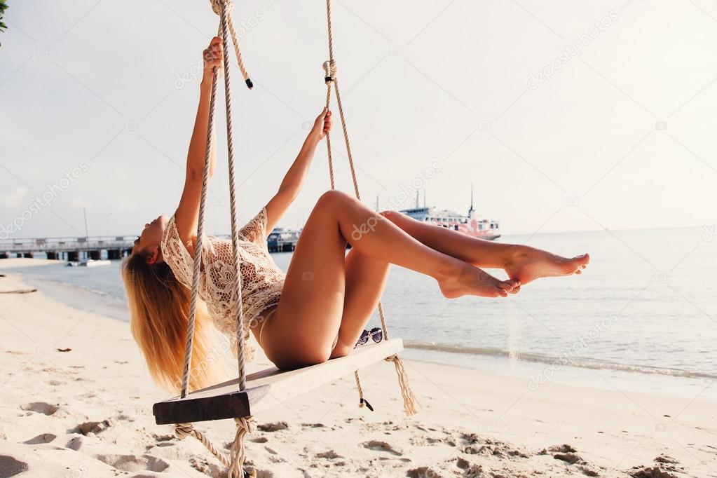 young blonde woman in bikini