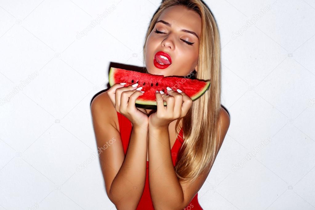 girl posed in swimsuit  with watermelon