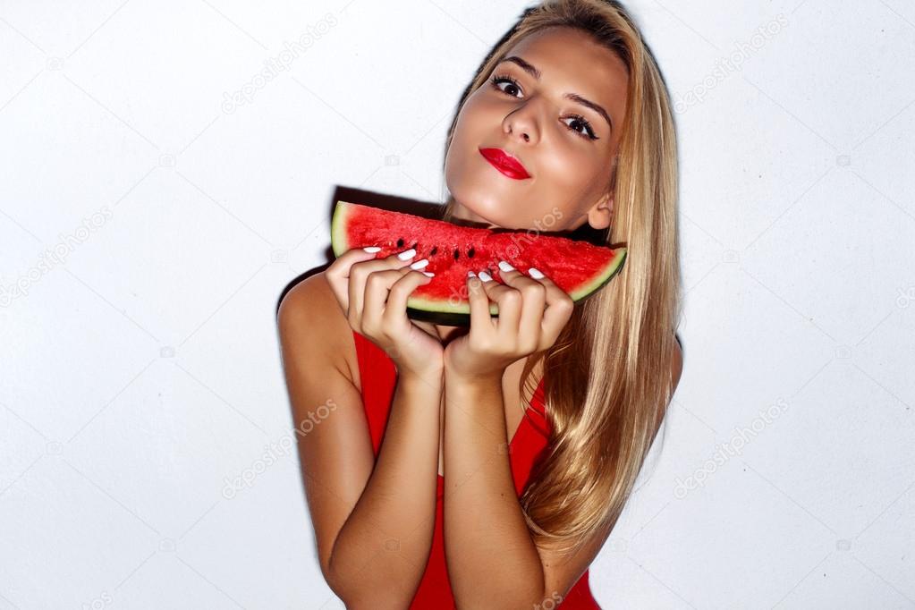 girl posed in swimsuit  with watermelon