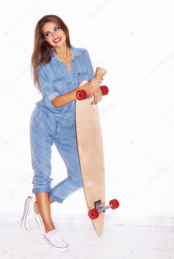 woman posing with longboard
