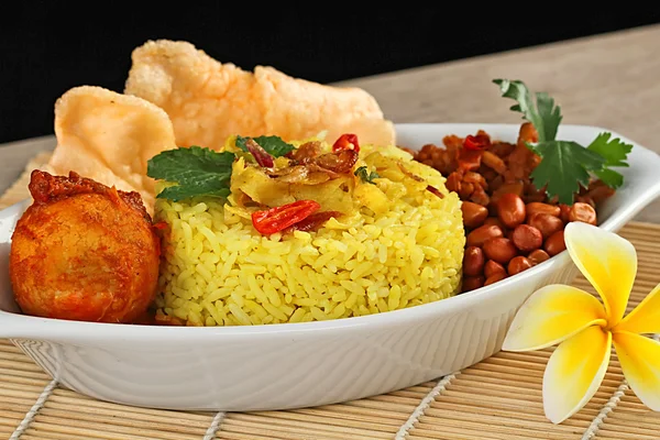 Yellow rice with spicy egg — Stock Photo, Image