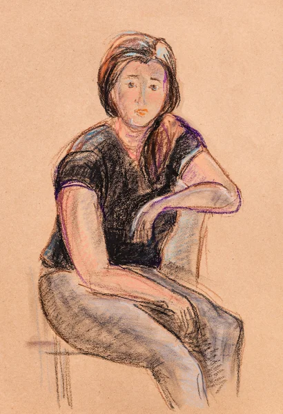 Mujer joven sentada — Foto de Stock