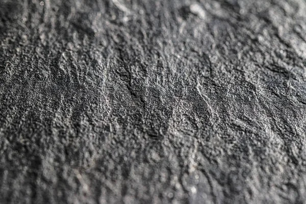 Textura de pedra cinza como fundo abstrato, material de design e superfície texturizada — Fotografia de Stock