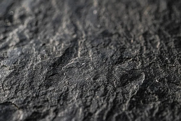 Texture de pierre grise comme fond abstrait, matériau de conception et surface texturée — Photo