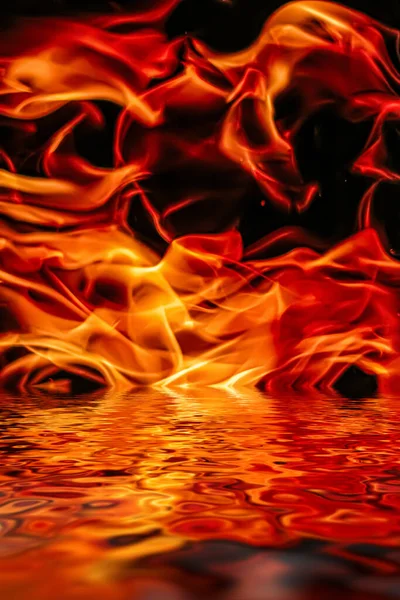 Hot fire flames in water as nature element and abstract background — Stock Photo, Image