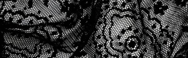 Black lace texture, fabric and textile background