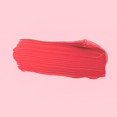 Kırmızı fırça darbesi ya da makyaj lekesi yakın çekim, güzellik kozmetiği ve ruj dokusu