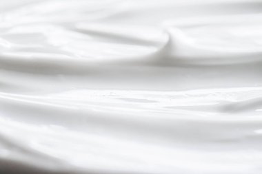 Arkaplan olarak saf beyaz krema dokusu, el yıkama kremalı sabun ve organik kozmetik.