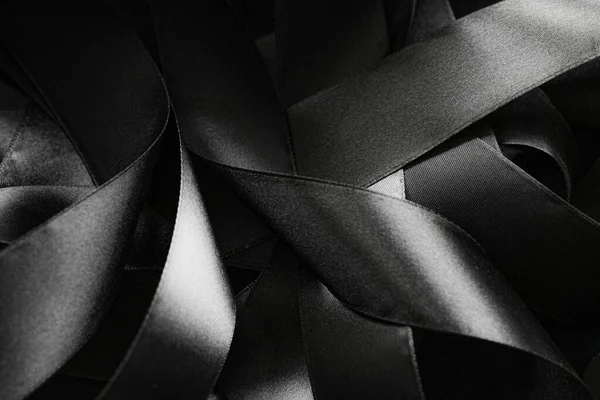 Black and white silk ribbon as background, abstract and luxury brand design