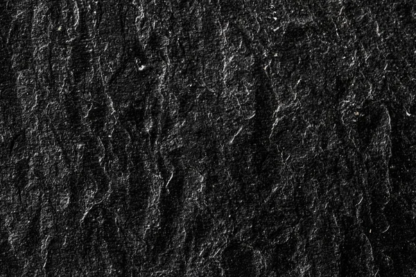 Textura de piedra negra como fondo abstracto, material de diseño y superficie texturizada —  Fotos de Stock