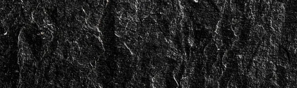 Textur aus schwarzem Stein als abstrakter Hintergrund, Designmaterial und strukturierte Oberfläche — Stockfoto