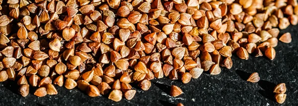 Buckwheat grain closeup, food texture and cook book background — Stock Photo, Image