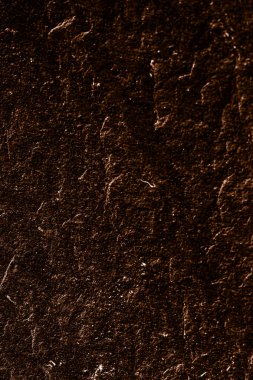 Soyut arkaplan olarak kahverengi taş dokusu, tasarım materyali ve desenli yüzey