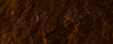 Soyut arkaplan olarak kahverengi taş dokusu, tasarım materyali ve desenli yüzey