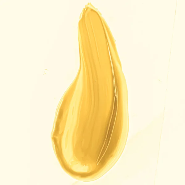 Pincelada dorada o maquillaje mancha primer plano, cosméticos de belleza y textura de lápiz labial —  Fotos de Stock