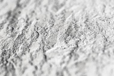 Soyut arkaplan olarak hafif taş dokusu, tasarım materyali ve desenli yüzey