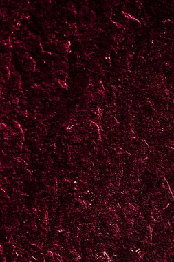 Soyut arkaplan olarak kırmızı taş dokusu, tasarım materyali ve desenli yüzey