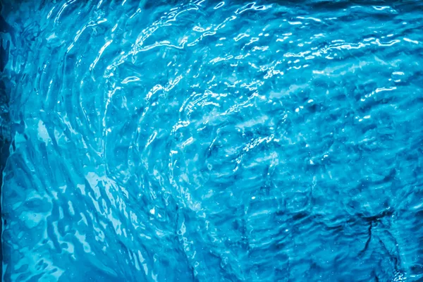 Μπλε υφή νερού ως αφηρημένο φόντο, πισίνα και τα κύματα σχεδιασμό — Φωτογραφία Αρχείου