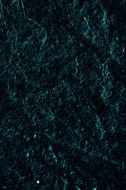 Soyut arkaplan olarak zümrüt yeşil taş dokusu, tasarım malzemesi ve desenli yüzey