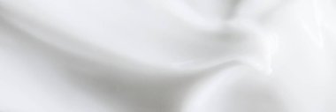 Arkaplan olarak saf beyaz krema dokusu, el yıkama kremalı sabun ve organik kozmetik.