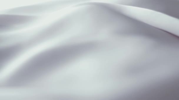 Текстура біло-шовкової тканини крупним планом як модний фон бренду, текстильна поверхня та розкішний гладкий матеріал — стокове відео