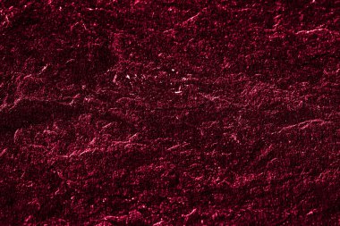 Soyut arkaplan olarak kırmızı taş dokusu, tasarım materyali ve desenli yüzey