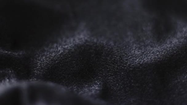 Tissu noir brillant texture close-up pour la marque de mode comme fond de paillettes de vacances, surface textile et matériau de luxe — Video