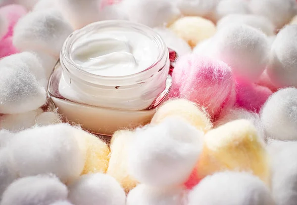 Luxury face cream for sensitive skin and eco cotton balls on background, spa cosmetics and natural skincare beauty brand product