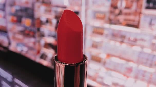 Red lipstick at beauty store, makeup and cosmetics — Stock Video