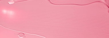 Lüks marka, tatil arkaplanı veya soyut duvar sanatı ve boya vuruşları için kozmetik arka plan, makyaj ve güzellik ürünleri olarak pembe ruj veya dudak parlatıcısı