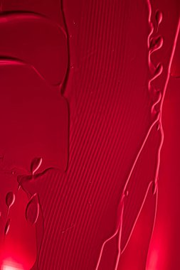 Lüks marka, tatil arkaplanı veya soyut duvar sanatı ve boya vuruşları için makyaj malzemesi olarak kırmızı ruj veya dudak parlatıcısı dokusu, makyaj ve güzellik ürünleri