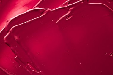 Lüks marka, tatil arkaplanı veya soyut duvar sanatı ve boya vuruşları için makyaj malzemesi olarak kırmızı ruj veya dudak parlatıcısı dokusu, makyaj ve güzellik ürünleri