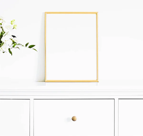 Golden frame on white furniture, luxury home decor and design for mockup, poster print and printable art, online shop showcase — Stock Photo, Image