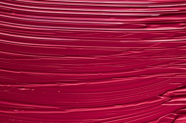 Lüks marka, tatil arkaplanı veya soyut duvar sanatı ve boya vuruşları için makyaj malzemesi olarak kırmızı ruj veya dudak parlatıcısı dokusu, makyaj ve güzellik ürünleri