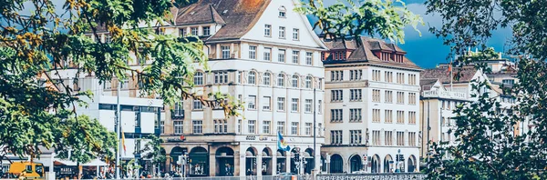 Cinematic view of historic Old Town street and buildings near the main train station Zurich HB, Hauptbahnhof, Swiss architecture and Travel destination in Zurich, Switzerland — стокове фото