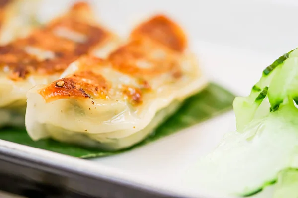 Dumplings with spinach, gyoza served as appetizer on plate in luxury asian restaurant, japanese food and vegetarian menu concept — Stock fotografie