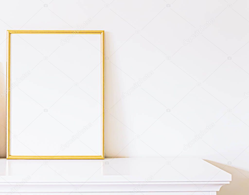 Golden frame on white furniture, luxury home decor and design for mockup, poster print and printable art, online shop showcase