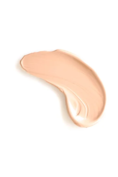 Beige Schönheit kosmetische Textur isoliert auf weißem Hintergrund, verschmutzte Make-up-Emulsion Creme Abstrich oder Foundation Fleck, zerkleinert Kosmetikprodukt und Farbstriche — Stockfoto