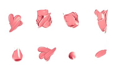 Mercan güzelliği kozmetik dokusu beyaz arka planda izole, lekeli makyaj emülsiyon kremi lekesi veya temel lekesi, ezilmiş kozmetik ürünler ve boya vuruşları