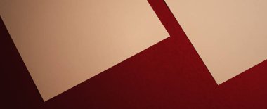 Boş A4 kâğıdı, koyu kırmızı arka planda bej ofis kırtasiyesi, lüks markalaşma düz yatak ve model kimlik tasarımı