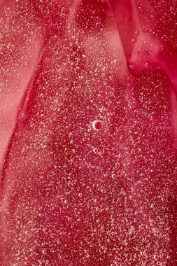 Soyut kırmızı sıvı zemin, boya sıçraması, girdap deseni ve su damlaları, güzellik jeli ve kozmetik doku, modern sihir sanatı ve lüks düz dizayn olarak bilim