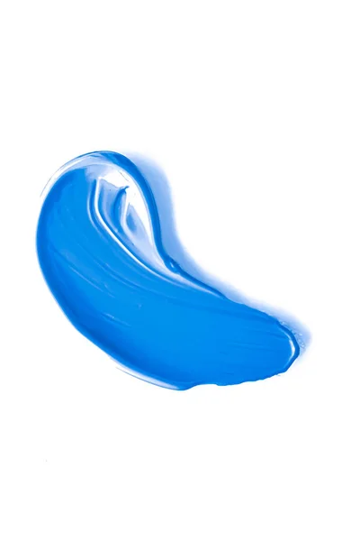 Textura cosmética de beleza azul cobalto isolada em fundo branco, mancha de maquiagem borrada ou mancha de produtos cosméticos, pinceladas de pintura — Fotografia de Stock