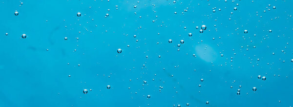 Текстура голубой воды как водный фон, концепция природы и науки, косметика по уходу за кожей и гигиенический макро крупный план