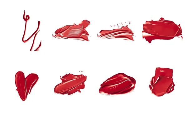 Röda läppstift prover som skönhet kosmetisk konsistens isolerad på vit bakgrund, makeup smutskastning eller fläck som kosmetika produkt eller måla stroke — Stockfoto