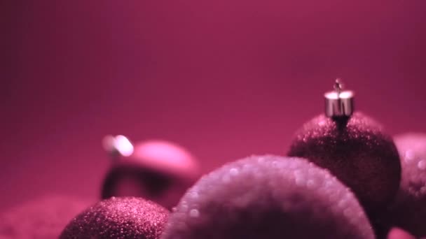 Fond de vacances de Noël rose, boules comme décoration d'hiver festive — Video