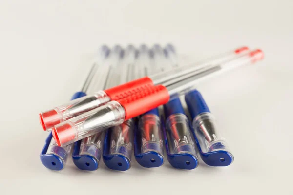 Set Blue Ballpoint Pens Lined Hardly White Backgroun — Stock Photo, Image